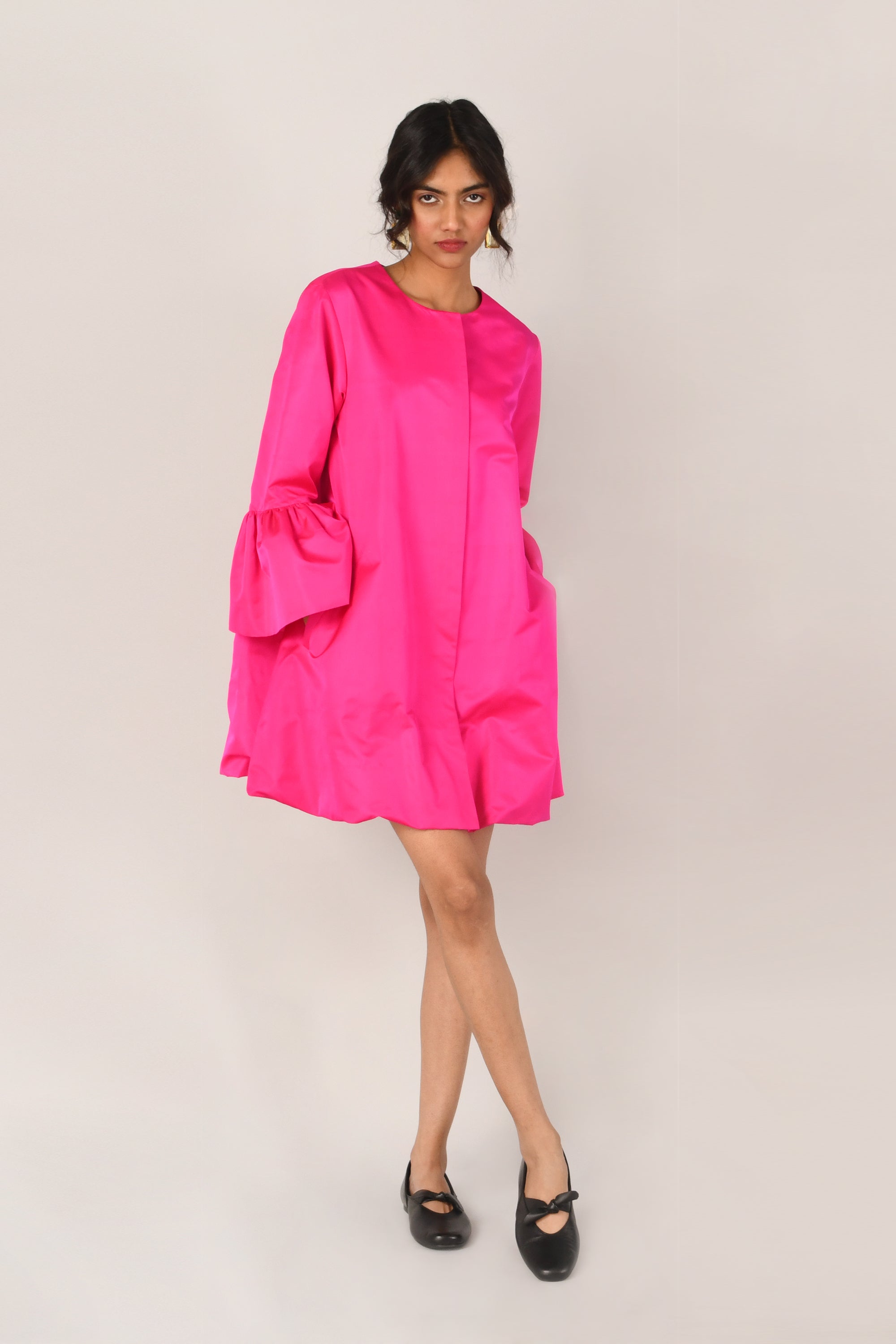 Rugosa Twisted Hem Zipper Dress